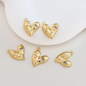 Five gold-plated heart charms with hammer texture and clear zircon for DIY jewelry