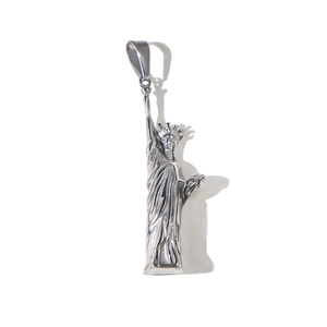 Detailed close-up of a silver Statue of Liberty pendant made of polished stainless steel