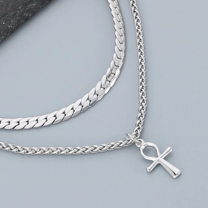 Detail of silver stainless steel double layer chain necklace with Egyptian Ankh cross pendant