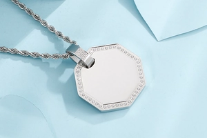 Detail of silver octagonal pendant with micro-pave cubic zirconia on twist chain
