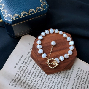 Detail of baroque freshwater pearl bracelet with 14K gold plated OT toggle clasp