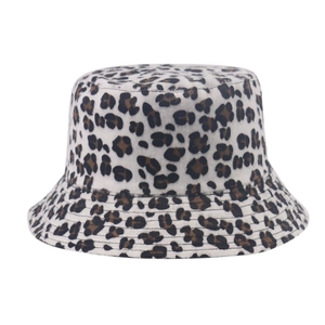 Detailed macro view of plush leopard print fabric texture on a soft bucket hat