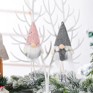 Pink and grey faceless gnome Christmas tree hanging ornaments with knit hats and boots