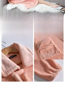 Detail of pink coral fleece bathrobe showing soft lapel collar and durable buttons