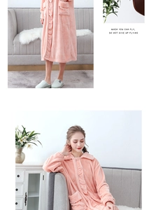 Detail of pink coral fleece bathrobe showing soft texture and ruffle collar trim
