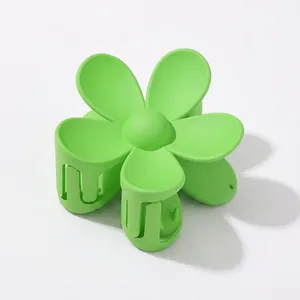 Matte lime green flower hair claw clip with minimalist five-petal design for summer styling
