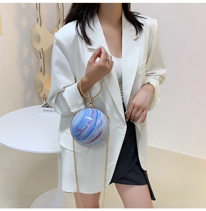 Chic spherical acrylic handbag with red blue marble pattern and gold ring handle