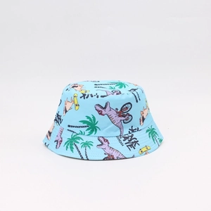 Close-up of light blue kids sun hat featuring colorful cartoon dinosaur and palm tree prints
