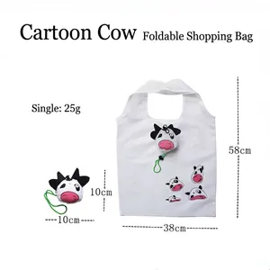 Foldable waterproof cow print shopping bag shown in open and compact cow head shape