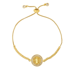 Gold Saint Benedict medal bracelet with zircon halo and adjustable bolo clasp