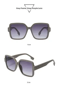 Detail view of oversized square sunglasses featuring textured pattern on side temples