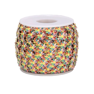 Macro view of 10mm colorful enamel daisy flower chain links for DIY jewelry making