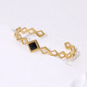 Minimalist geometric titanium steel open bracelet with black diamond center in gold finish