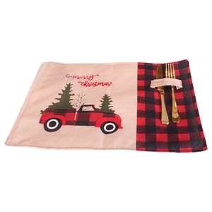 Christmas burlap placemat with red truck embroidery and buffalo plaid pocket for cutlery