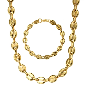 Detailed view of gold-plated coffee bean link necklace and bracelet jewelry set