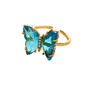 Elegant gold butterfly ring with blue crystal wings and adjustable band for women