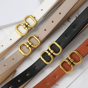 Set of four thin leather belts in white, beige, black, and brown with gold double ring buckles