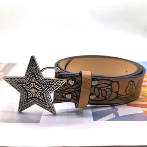 Vintage brown leather belt with rose embossing and oversized silver star buckle
