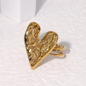 Minimalist 18K gold plated heart ring with irregular lava texture in an open design