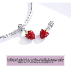 Detail of S925 silver strawberry charms with red enamel and pavé zircons on a snake chain