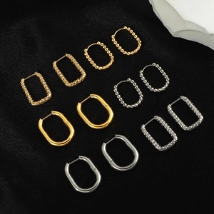 10-piece gold and silver geometric hoop earrings set with hammered and woven textures