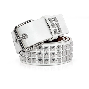 Detail of white leather belt with silver pyramid studs and polished metal buckle