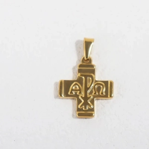 Detailed macro view of a gold-plated Chi-Rho and Alpha Omega symbol cross pendant