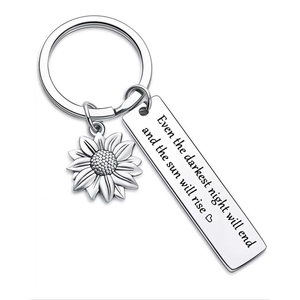 Sunflower keychain with engraved stainless steel plate on a white background