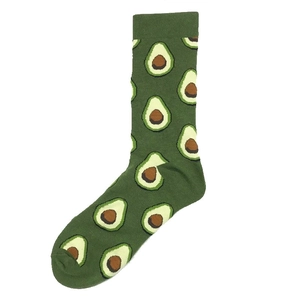 Green cotton mid-calf socks with creative avocado patterns on white background