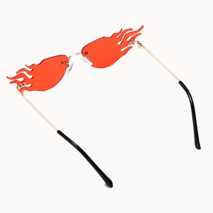 Fashion rimless small flame shaped sunglasses with red lenses and gold metal temples