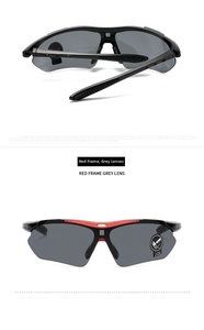 Detail of sport sunglasses featuring black frame with red metallic accents and TAC lenses