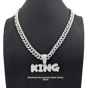 Detailed close-up of iced-out KING pendant on 60cm silver Cuban link chain necklace