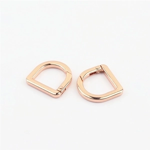 Pair of rose gold D-ring spring clasps for handbag straps and luggage hardware