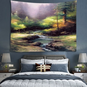 Close-up of scenic forest stream tapestry wall hanging above a bedroom headboard