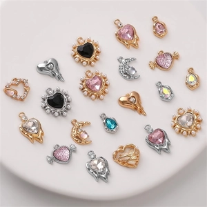 Detailed assortment of mixed shape alloy pendant charms with colorful AB rhinestones and pearls