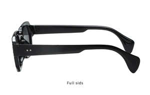 Vue latérale de lunettes de soleil ovales vintage avec monture en plastique noir et rivets