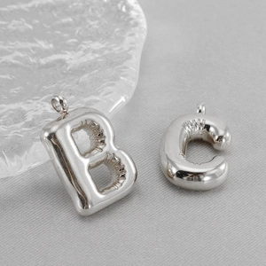 Chubby bubble style stainless steel letter B and C pendants in silver finish