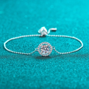 Classic S925 sterling silver halo bracelet featuring a sparkling round moissanite stone