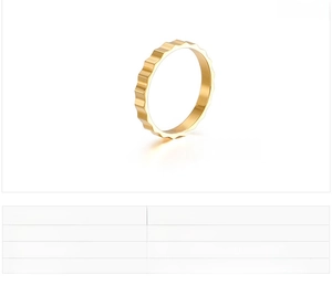 Detail showing dimensions of wave-edged minimalist stainless steel ring in gold finish