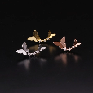Double butterfly stainless steel earrings with sparkling diamonds in gold and silver