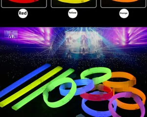 Macro view of multi-color glow sticks and bracelets in red, yellow, orange, blue, and green