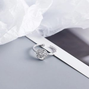 Detail showing irregular hammered texture on a silver S925 sterling silver ring