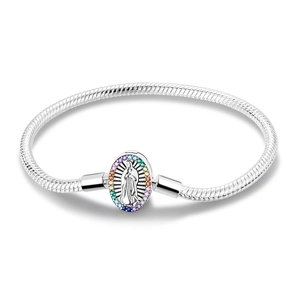 Detail of silver snake chain bracelet with Virgin Mary pendant and colorful gemstones