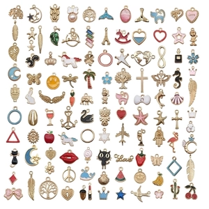Assorted DIY jewelry charms in gold and silver finish for earrings and necklaces