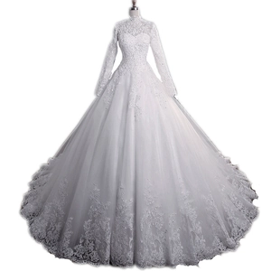 Elegant white long sleeve lace wedding dress with high neck and full ball gown skirt