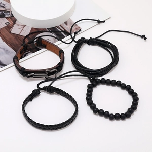 Men's 4-piece leather bracelet set with guitar charm and black beads on white background