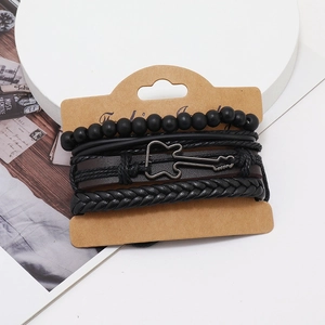 Set of 4 multilayer woven leather bracelets featuring a silver guitar pendant on display