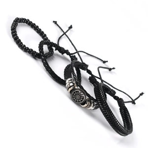 Set of four men's minimalist bracelets featuring black leather, beads, and metal star charm
