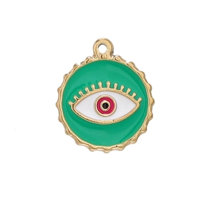 Detail of a green evil eye pendant with gold plating and colorful enamel finish