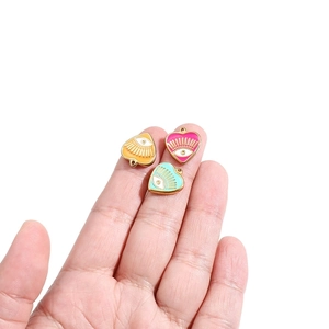 Evil eye heart charms in yellow, pink, and blue enamel for DIY jewelry making
